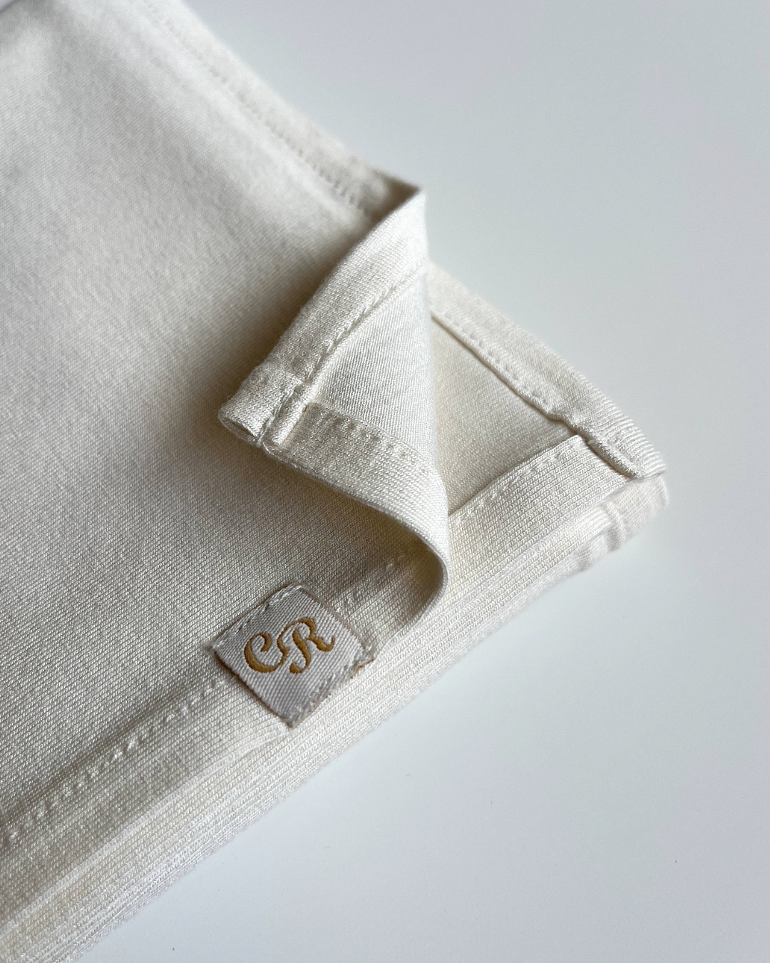 chale en jersey blanc casse vue de details